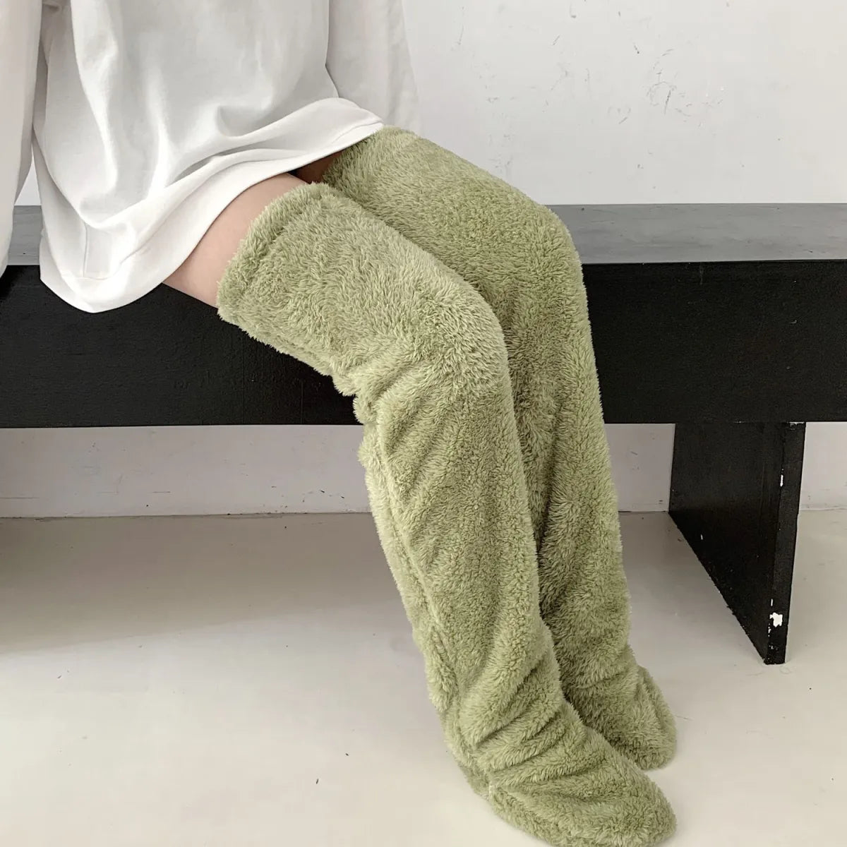 Calcetines de peluche, calor hasta la rodilla